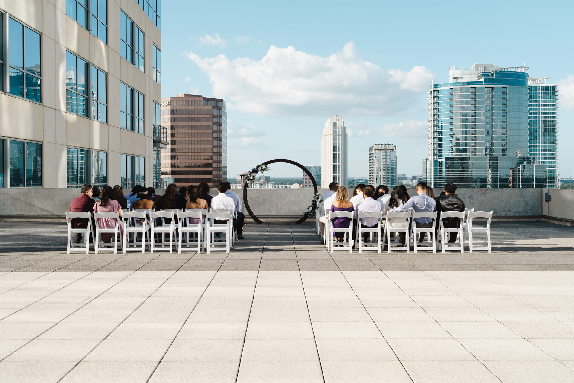 Rooftop wedding ceremony at golden hour